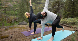 Joob beanie doing yoga in the woods